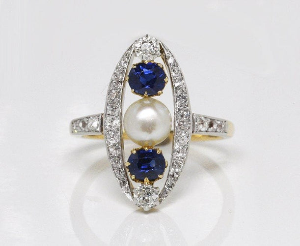 Bague 55 Bague marquise Belle Epoque, diamant, saphirs et perle fine 58 Facettes