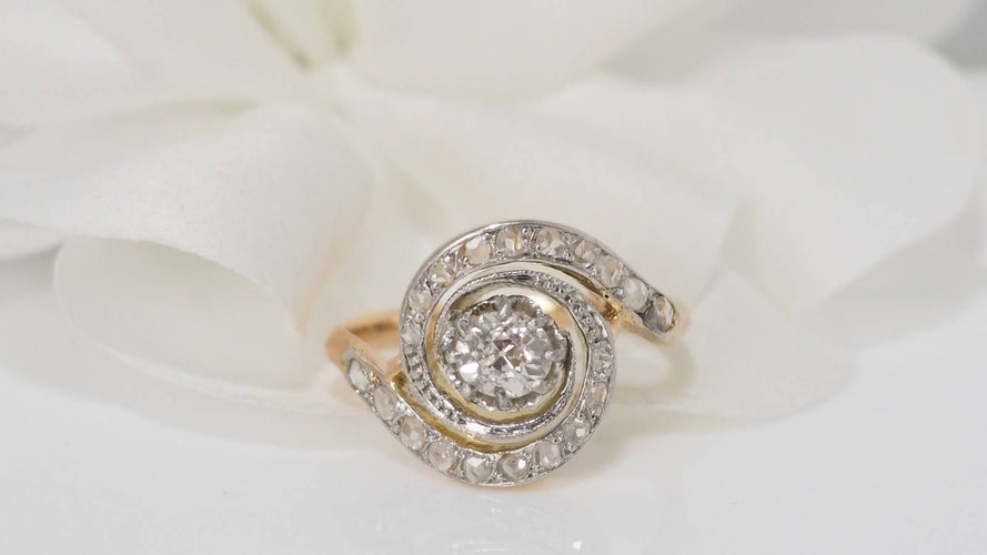 Bague Bague tourbillon en or bicolore et diamants 58 Facettes 31338