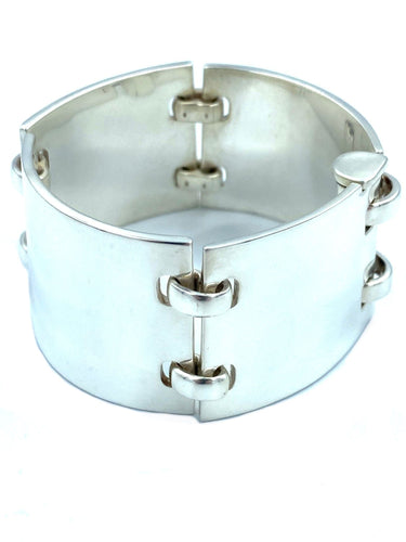 Bracelet HERMÈS. Bracelet manchette articulée argent 58 Facettes