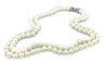 Collier Bucherer. Important collier double rangs perles et diamants 58 Facettes