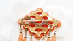 Broche Broche ajourée Napoléon III perles corail et émail noir 58 Facettes 30349