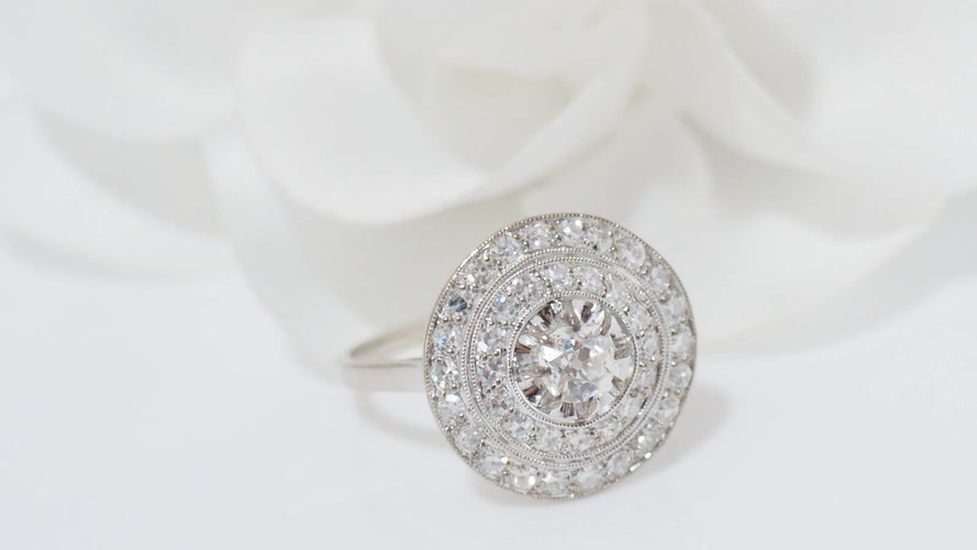 Bague Bague Art Déco double entourage de diamants en or blanc et platine 58 Facettes 31669