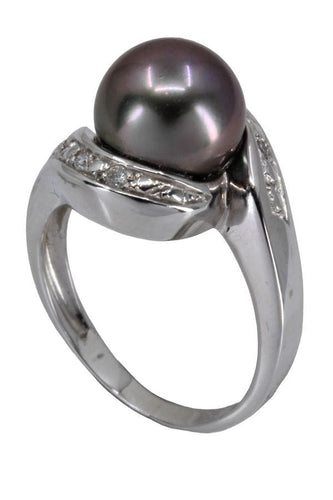 Bague 50 BAGUE TOURBILLON PERLE DE TAHITI ET DIAMANTS 58 Facettes 056421