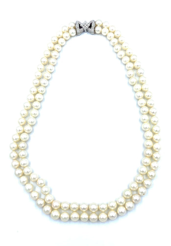Collier Bucherer. Important collier double rangs perles et diamants 58 Facettes