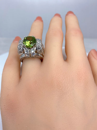 Bague Bague Art Déco Platine diamants et péridot 58 Facettes