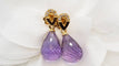 Boucles d'oreilles Boucles d'oreilles en or jaune, améthystes briolettes et diamants 58 Facettes 30346