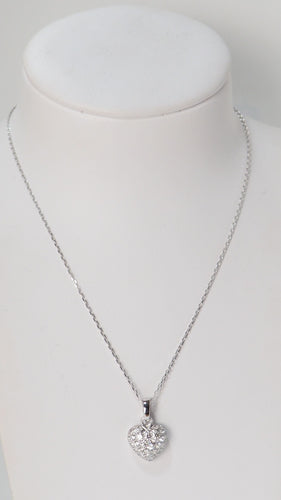 Collier Collier Cartier pendentif cœur, or blanc et diamants 58 Facettes 13807