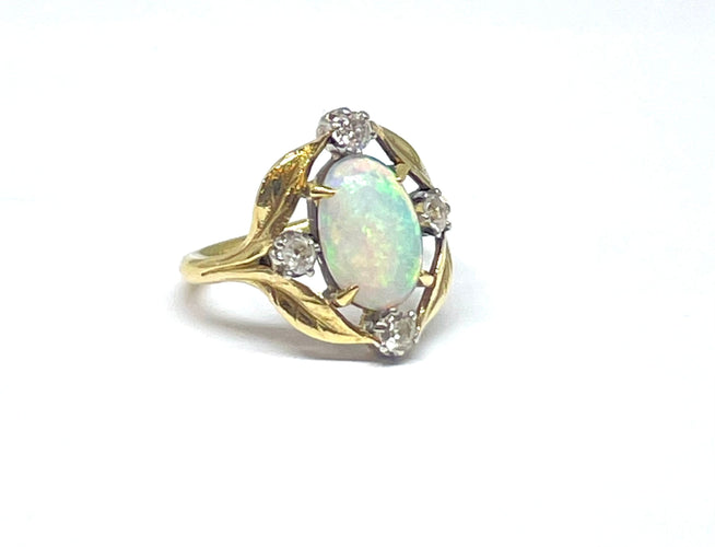 Bague Bague opale et diamants monture en or jaune 18 carats 58 Facettes