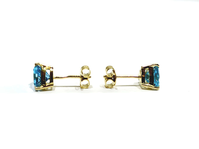 Boucles d'oreilles Paire de boucles d'oreilles or et topaze bleue 58 Facettes