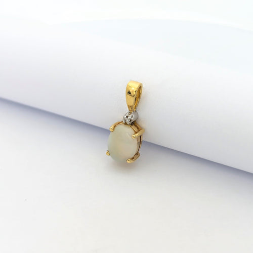 Pendentif Pendentif en or jaune et opale 58 Facettes 27529