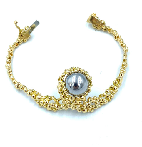 Bracelet GILBERT ALBERT. Bracelet en or jaune et billes interchangeables 58 Facettes