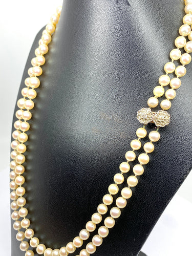 Collier Double collier de perles fermoir diamants. 58 Facettes AB170