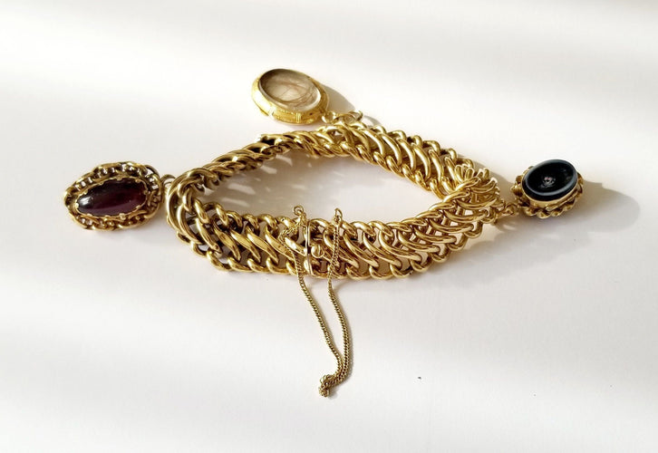 Bracelet Bracelet maille américaine or jaune et breloques 58 Facettes