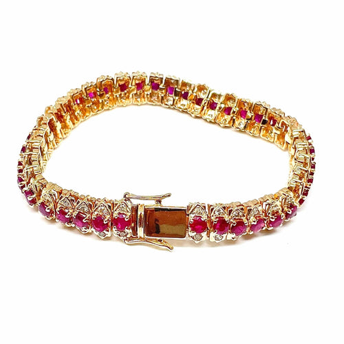 Bracelet Bracelet vintage en or, rubis et diamants 58 Facettes