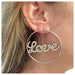 Boucles d'oreilles Créoles en or blanc et diamants "Love You". 58 Facettes 27406
