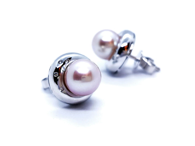 Boucles d'oreilles Boucles d'oreilles Or blanc Perle 58 Facettes 990440CN
