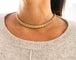 Collier Collier Tubogas 1950 en or jaune 58 Facettes