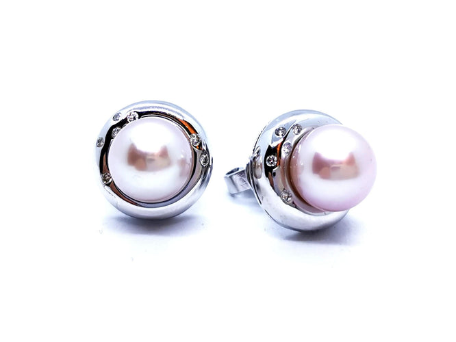 Boucles d'oreilles Boucles d'oreilles Or blanc Perle 58 Facettes 990440CN